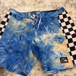 Quiksilver Blue Tie-Dye Swim Board Shorts with Black-and-White Checker Panels